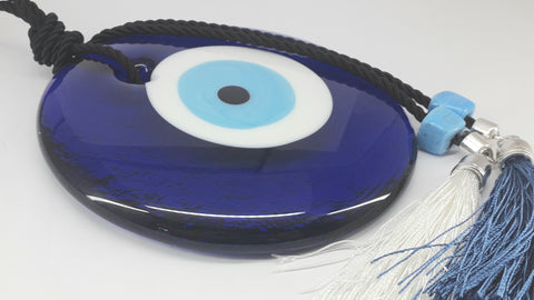 a blue frisbee sitting on top of a blue plate 